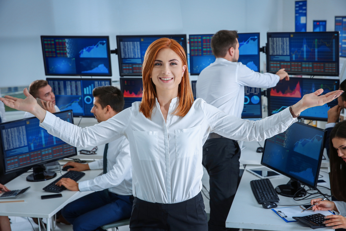 Female Stock Trader Working in Office